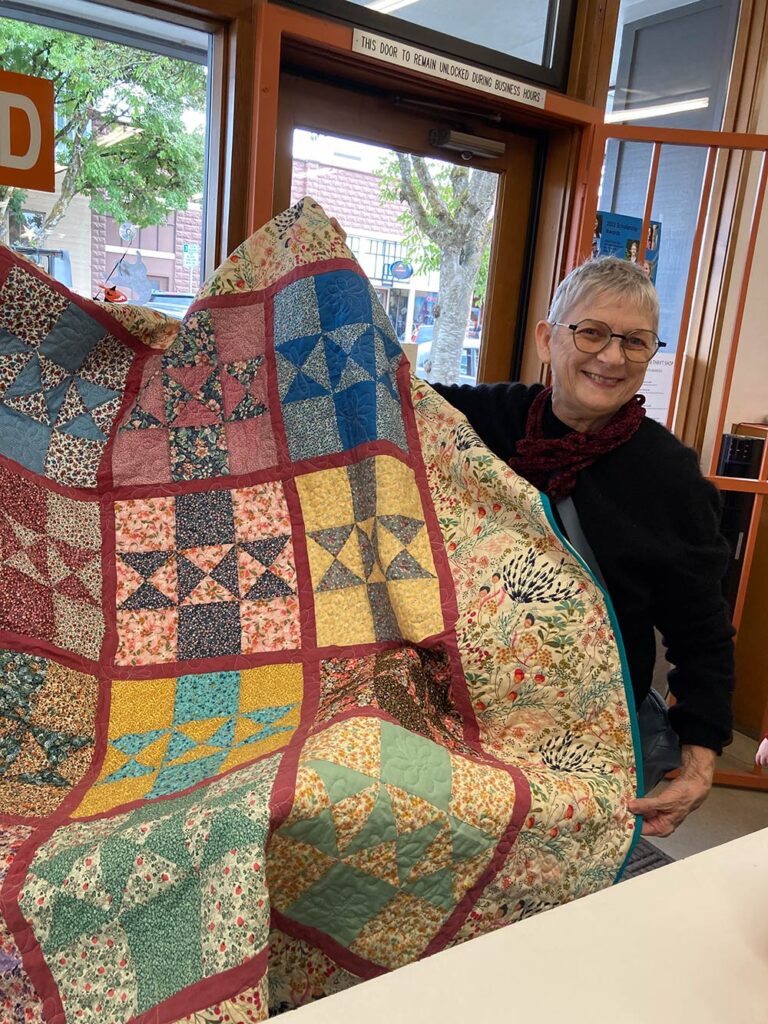 This quilt was entirely made out of fabric donated and purchased at the Corvallis Community Thrift Shop. It exemplifies our new logo which indicates the full circle of donations giving back to our community in beautiful ways beyond providing scholarships and grants!